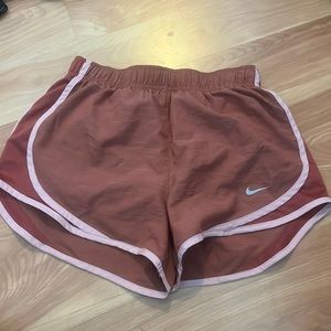 Mauve Nike running shorts